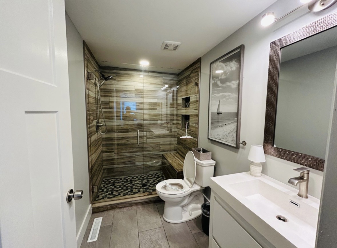 Bathroom with walk-in tiled shower