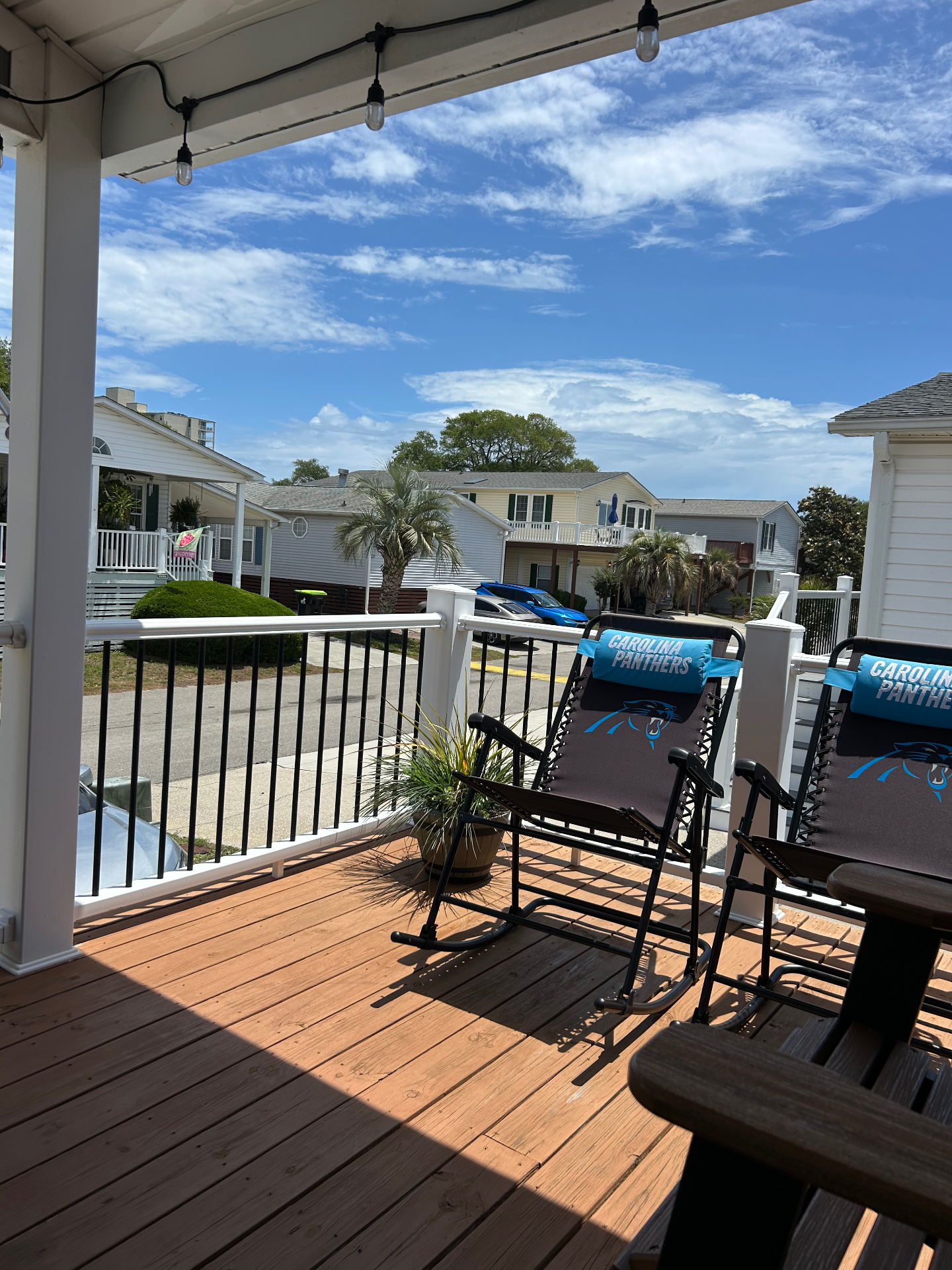 Covered porch with rocking chairs